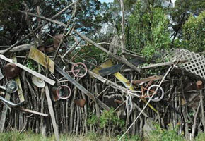 Unusual fence, photo of a fence with trash