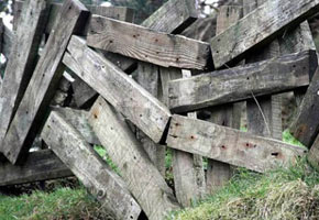 Fence from boards, photo of an unusual fence