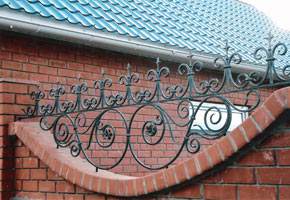 brick fence with forging, photo