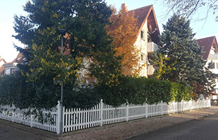 photo of a plastic picket fence